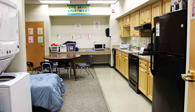 A life skills apartment at a special needs school waits to help students learn independence.