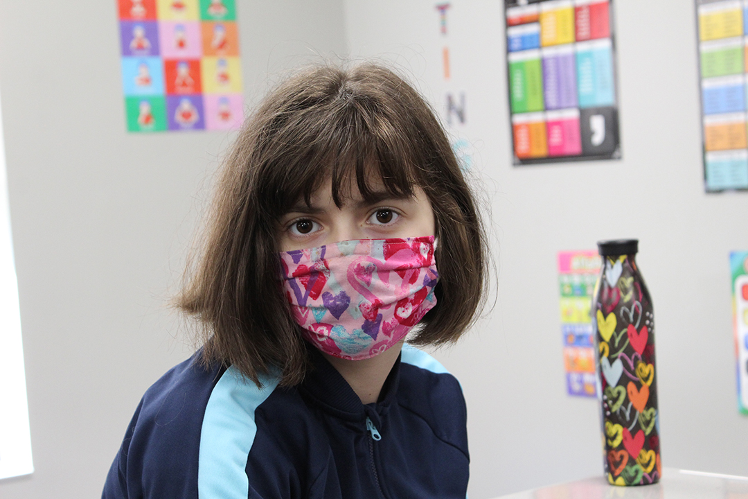 Special Education Student in colorful mask. 